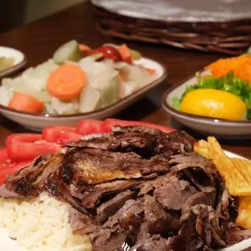 Esnaf Sofrası Instagram paylaşımındaki et yemeği ve pilav tabağı
